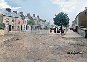 A Victorian image that has been fully restored, colourised and HD enhanced of a busy Duke Street, Warrenpoint 