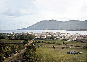 Old image of Warrenpoint, with St Peter's church Carlingford Lough and the Cooley mountains in the distance. The image has been colourised, HD enhanced and fully restored.