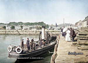 A Victorian image of a steamer boat readying to sail from Warrenpoint harbour. The images has been fully reatored and colourised 