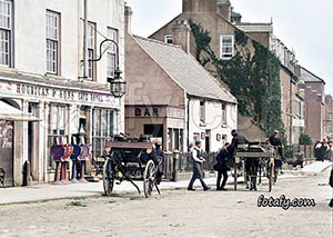 An old image of Hourican and Sons Cafe Royal, Havelock Place, Warrenpoint. The images has been fully restored and colourised