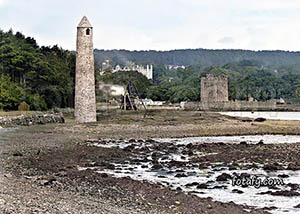 An old image that has been fully restored, HD enhanced and colourised of Narrow Water Castle and the neighbouring watch tower.