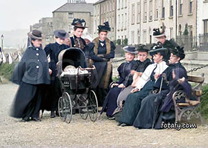 An old image of a group of ladies at Osborne Terrace. The image has been restored, colourised and HD enhanced.