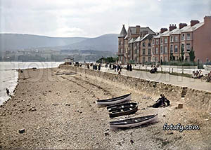 A Victorian image of the promenade and sea front at Warrenpoint. The image has been colourised and fully restored.