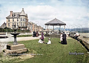 A 1900's image that has been restored and colourised of The Great Northern Hotel, promenade, bandstand and fountain in Warrenpoint.