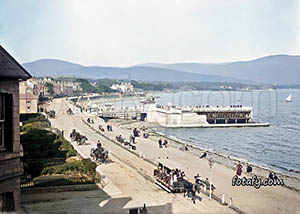 A Victorian image that has been restored, colourised and HD enhanced of Warrenpoint promenade and swimming baths.