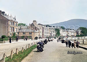 An old image that has been fully restorted, colourised and HD enhanced of the promenade and swimming baths entrance in Warrenpoint