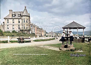 A Victorian era image that has been restored, colourised and HD enhanced of the promenade, fountain and Great Northern Hotel in Warrenpoint