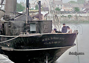 An old image of the Welshman ship docked in Warrenpoint Quays. The image has been colourised , fully restored and HD enhanced