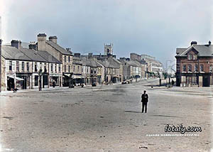 An old image of Warrenpoint Square and Church Street. The image has been restored, colourised and HD enhanced