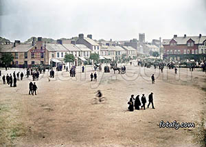 An old image of Duke Street, Church Street and The Square in Warrenpoint. The image has been fully restored, colourised and HD enhanced.