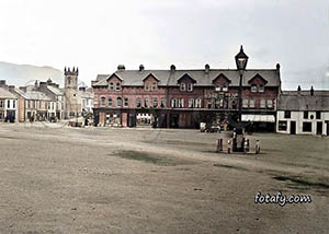 An old image that has been fully restored, colourised and HD enhanced of Warrenpoint Square and the Church.