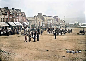 An old image that has been colourised, fully restored and HD enhanced of a sheep market in Warrenpoint Square.