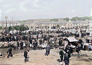 A Victorian image that has been restored, colourised and HD enhanced of sheep market in the Square Warrenpoint